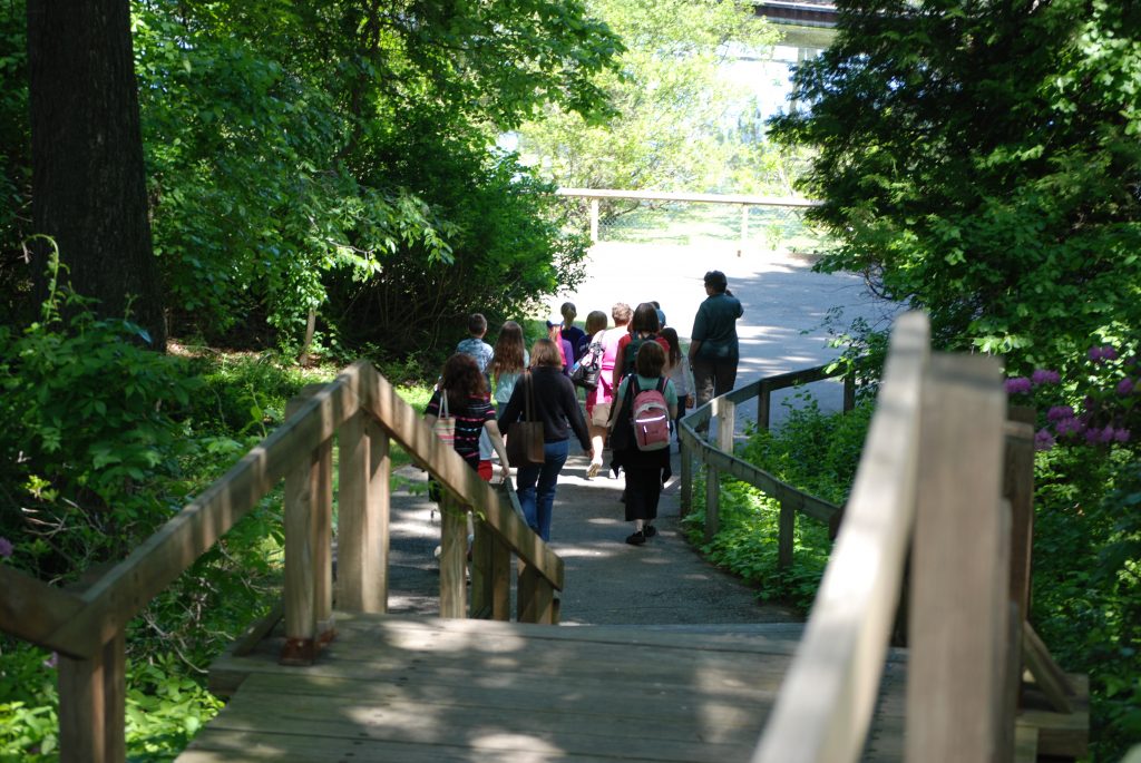 Students follow a tour guide at the Sanctuary