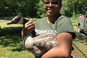 Ashlynn Toles holding a Canada Goose