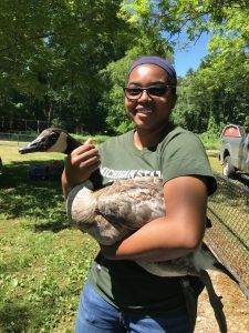 Ashlynn Toles holding a Canada Goose