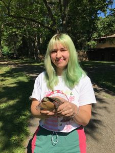 Cheyenne Cope holding a Painted Turtle