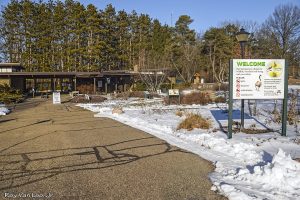 Kellogg Bird Sanctuary main entrance welcome sign with snow