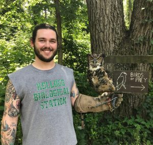 Brenden Kokx holding Great Horned Owl