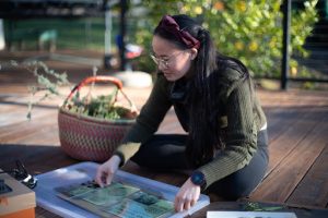 Artist Callie Chappell creating a cyanotype image. Photo credit to Evan Dorsky.